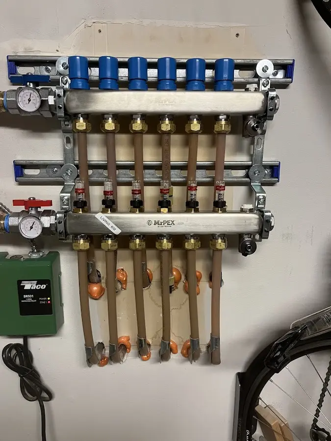 Plumber performing Leak Detection at a residential property in Spencer